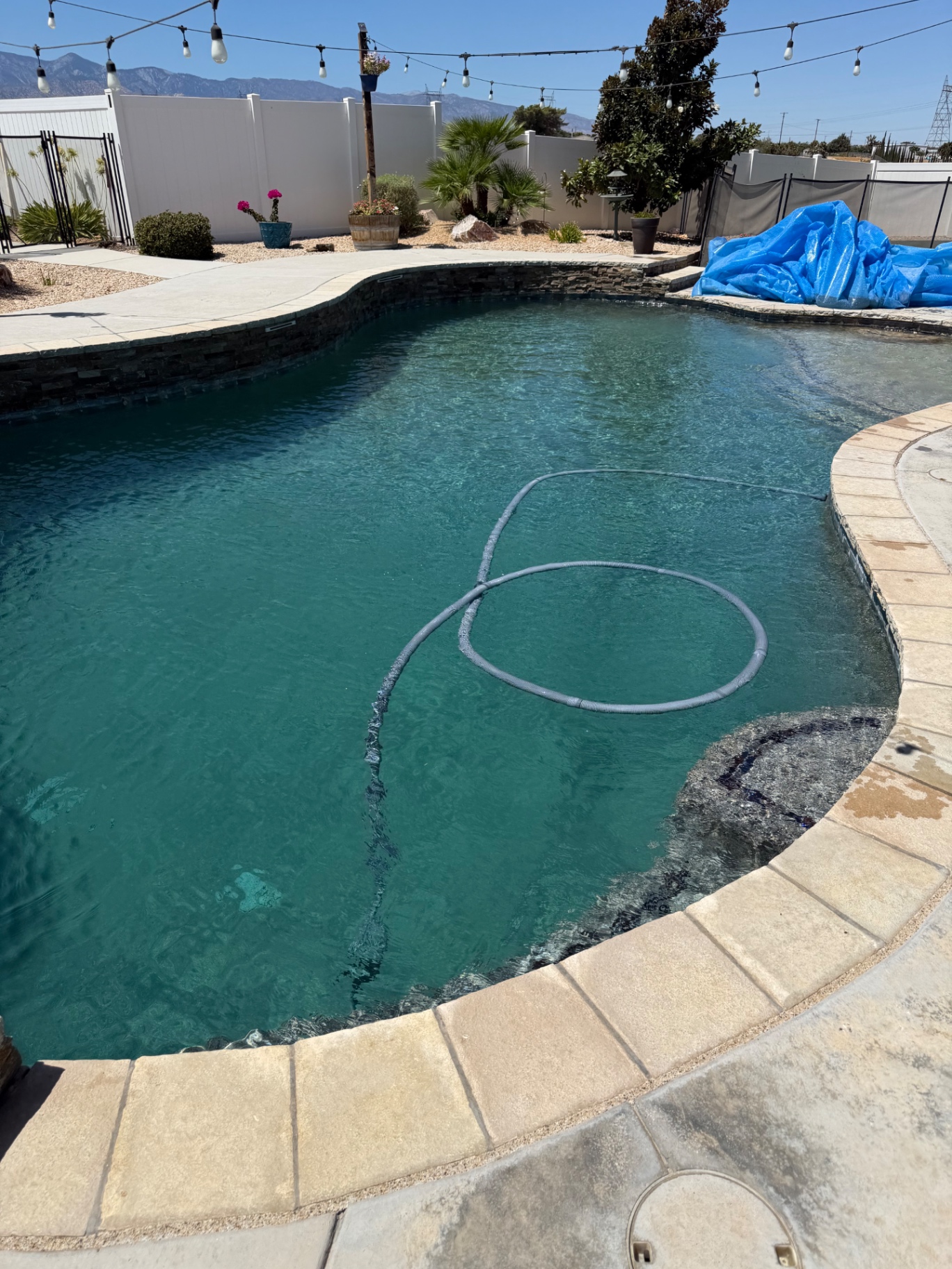 Pool and spa spillover with mountain views